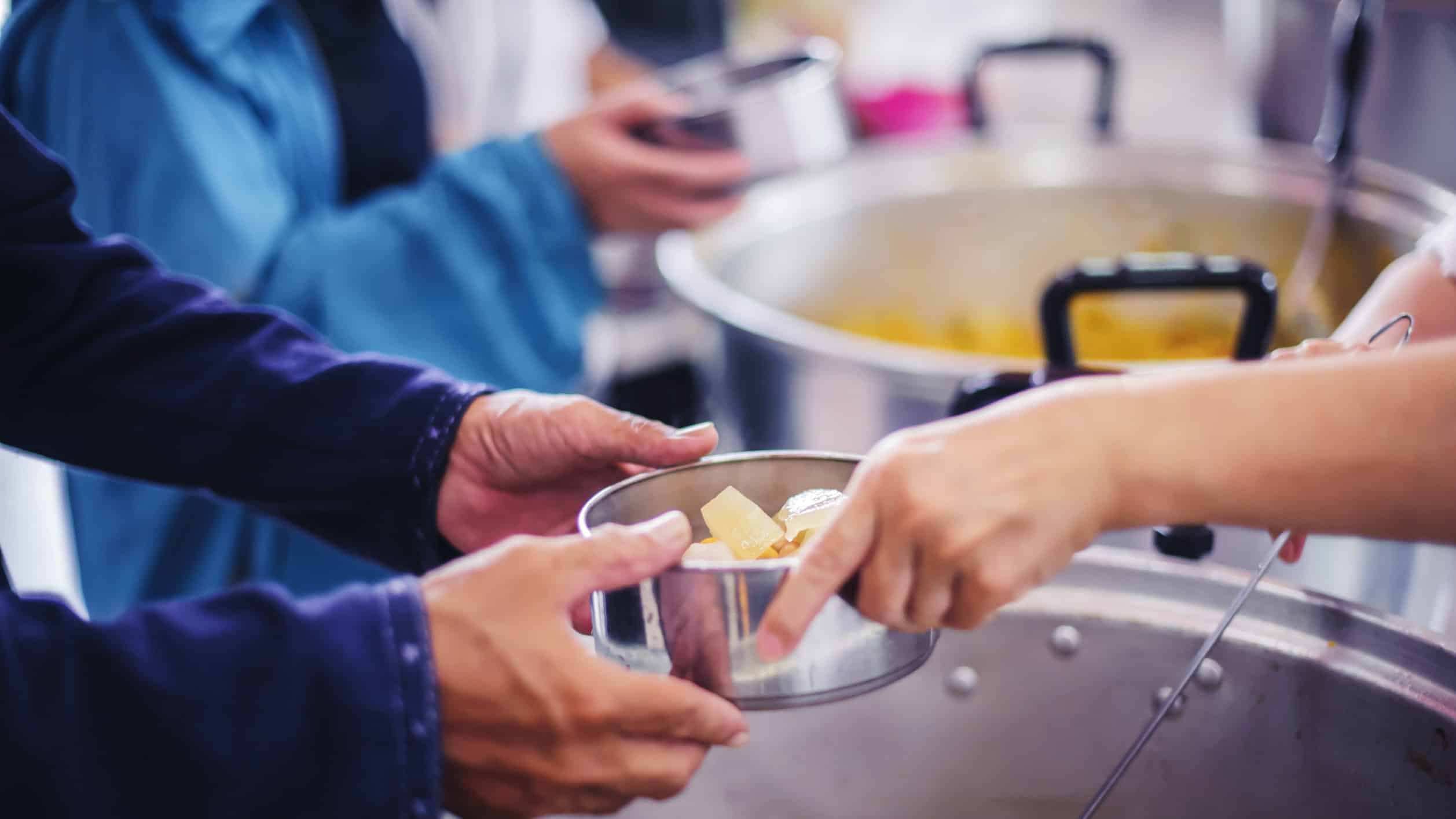 Volunteers serving food