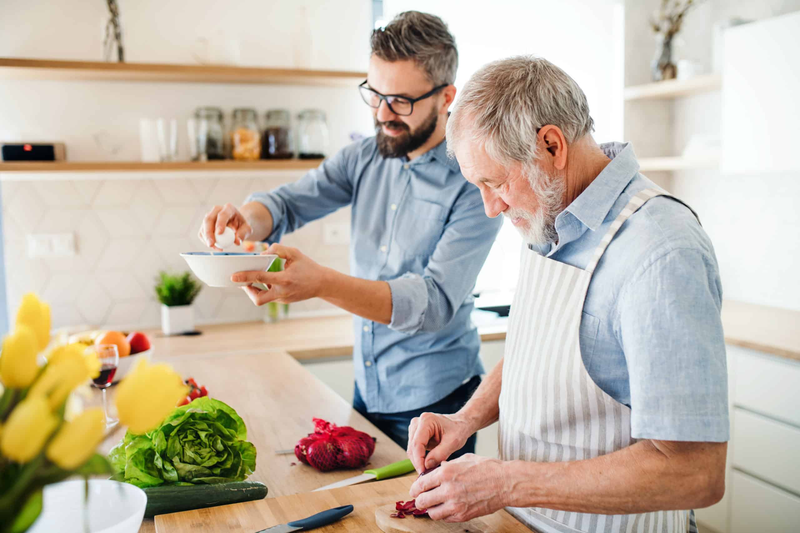 Two men cooking together