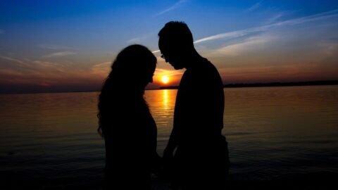 Two People Praying